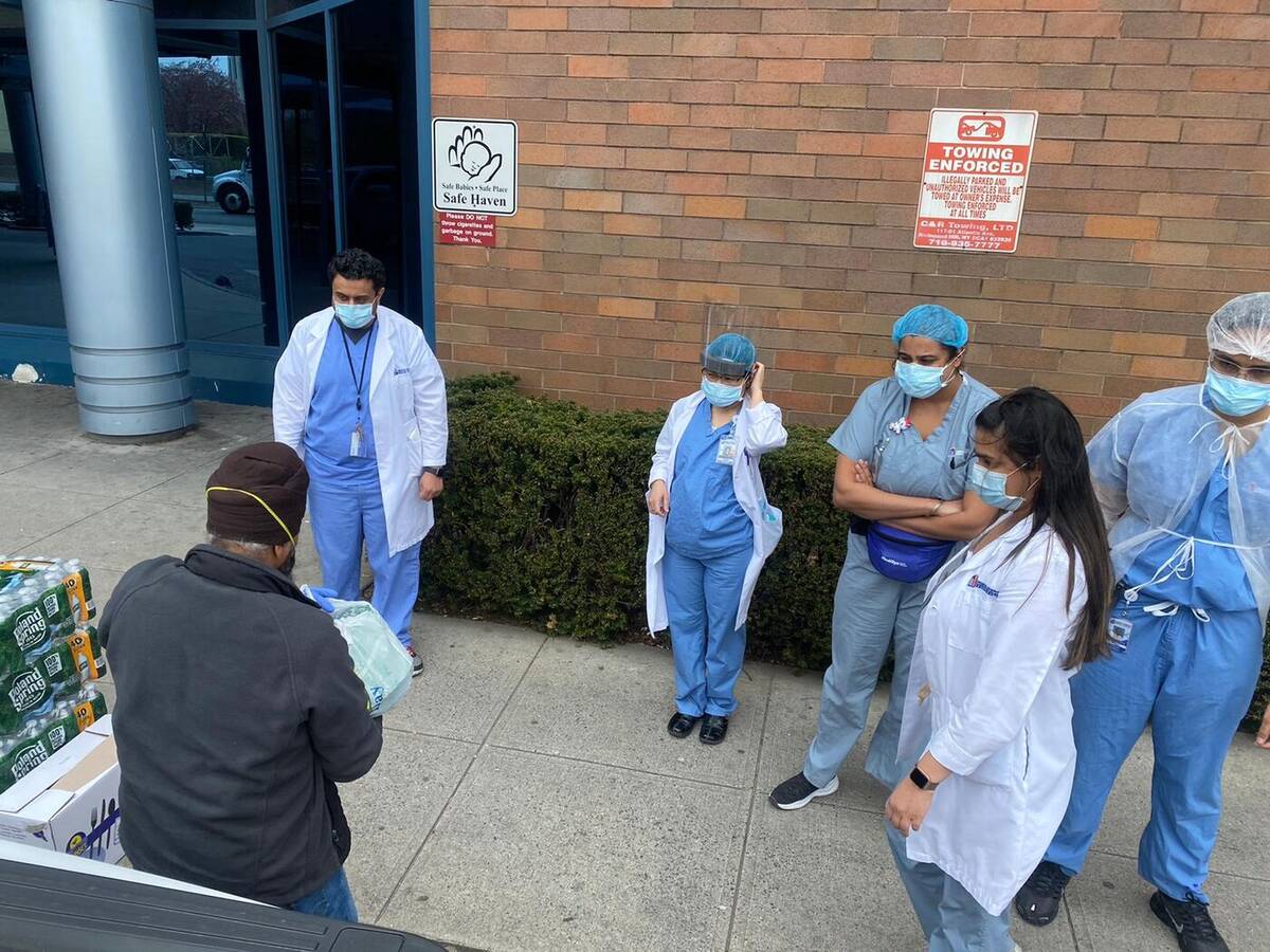 Safetech staff volunteering at a local community event