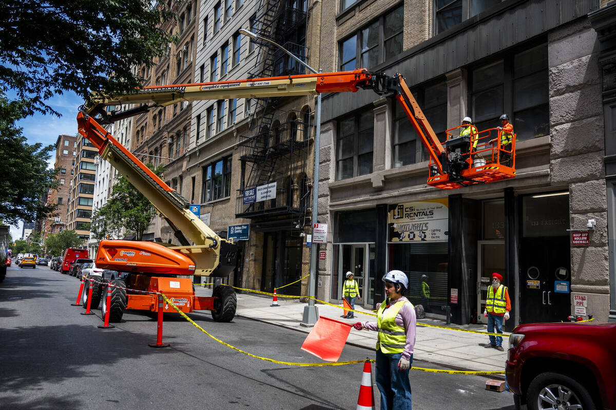 On-site exterior wall inspection using a boom lift