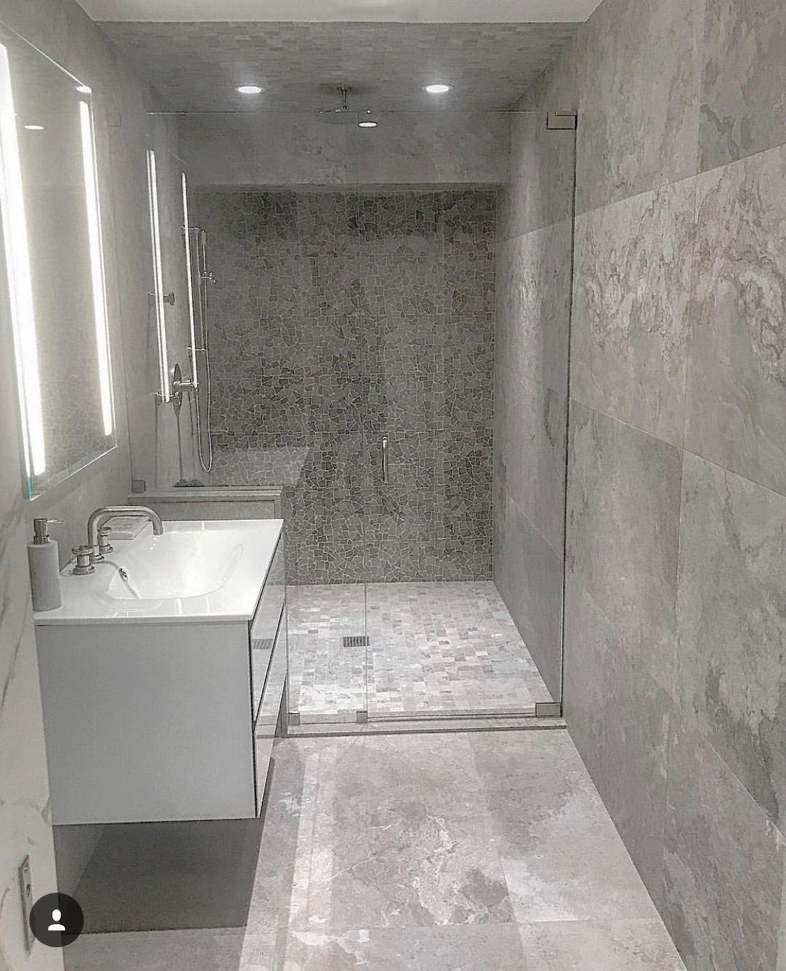Marble tile walk-in shower with rainfall showerhead