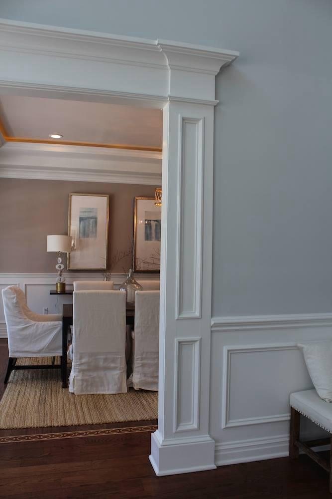 Custom crown molding detail around an interior archway