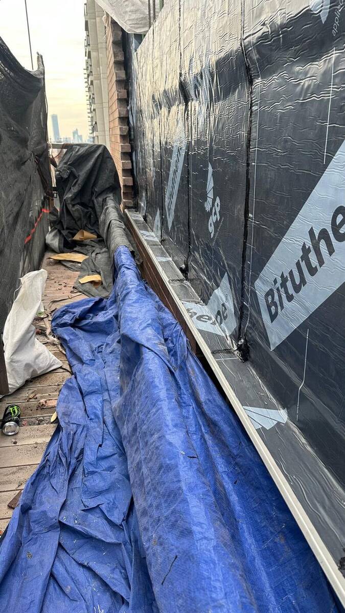 Roof membrane waterproofing installation in progress